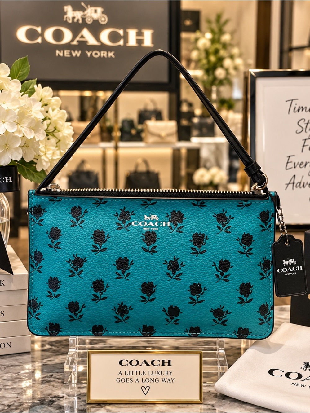 COACH Teal Leather Shoulder Pouch with Black Floral Print